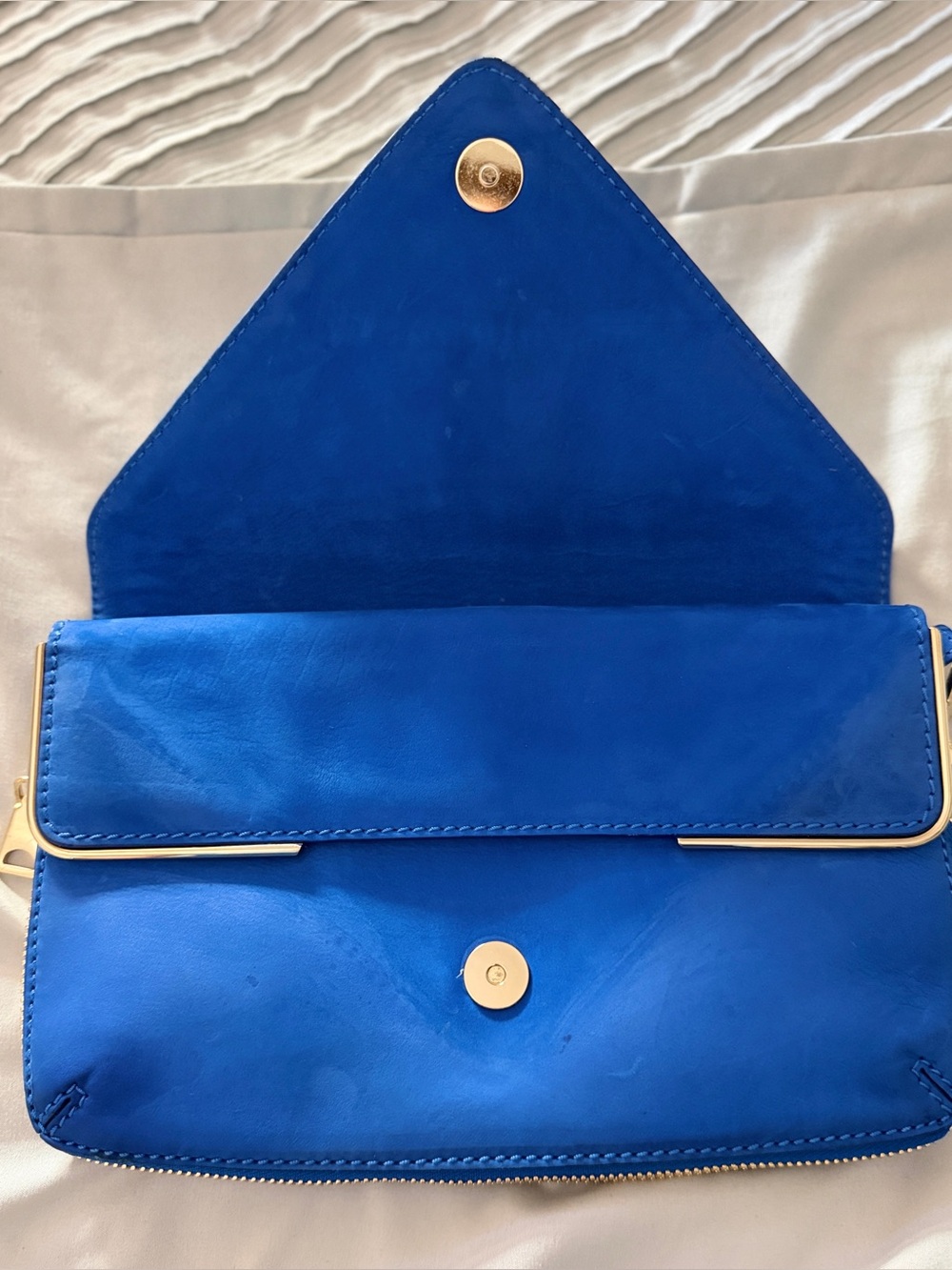 Luxury Designer Brian Atwood 
Blue suede clutch purse with gold zippers